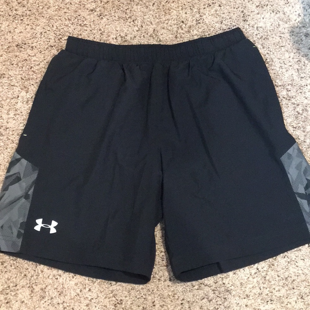 Four pair of Under Armour running shorts